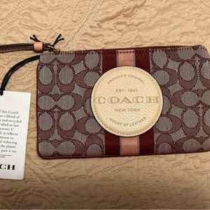 Coach Signature Wristlet in Red and Pink